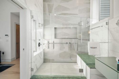 a bathroom with a shower with a glass door at Coastal Luxury Near Wellfleets Best Beaches in Wellfleet