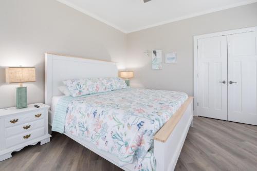 Ένα ή περισσότερα κρεβάτια σε δωμάτιο στο Grey Pearl Villa