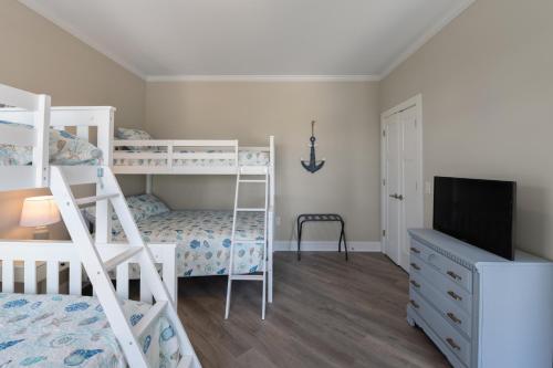 Ένα ή περισσότερα κρεβάτια σε δωμάτιο στο Grey Pearl Villa