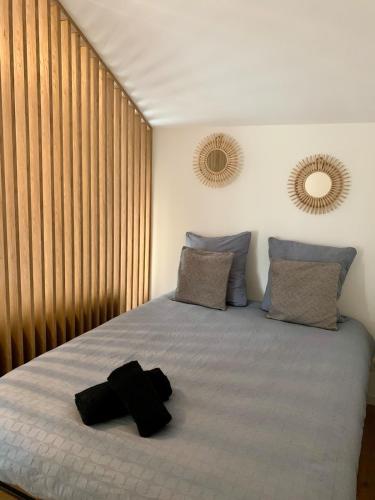 Ένα ή περισσότερα κρεβάτια σε δωμάτιο στο L Écrin de Nancy