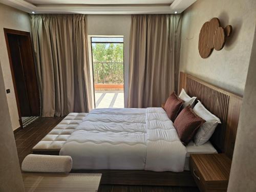 Ένα ή περισσότερα κρεβάτια σε δωμάτιο στο Villa des Perles