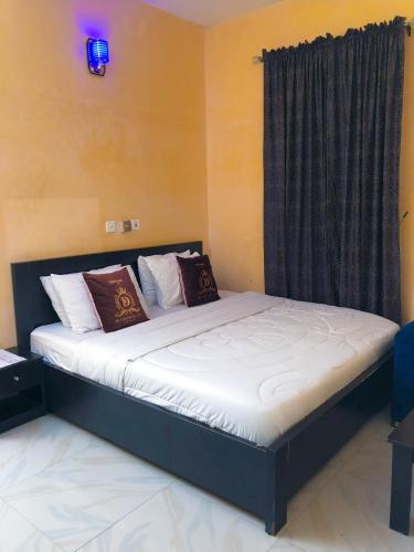 Postel nebo postele na pokoji v ubytování De Stezi Hotel