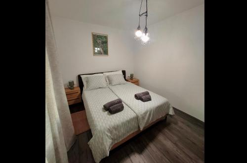 Ένα ή περισσότερα κρεβάτια σε δωμάτιο στο Casa Tone