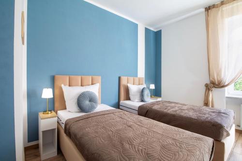Ένα ή περισσότερα κρεβάτια σε δωμάτιο στο Home-ON Rüdesheim