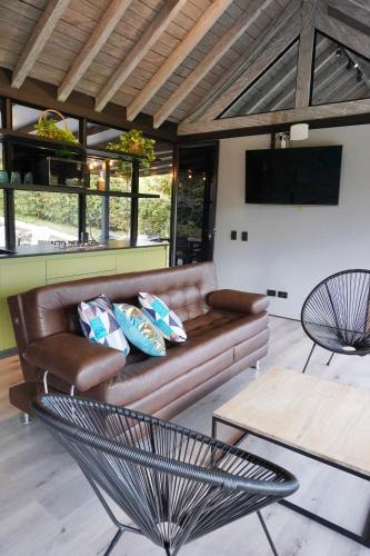 TV a/nebo společenská místnost v ubytování Cumbres Luxury Glamping