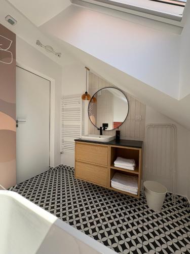 a bathroom with a sink and a mirror at Vila Salt & Soul in Sovata