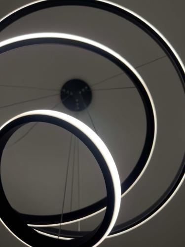 a mirror in a ceiling with a clock in it at Casa Maria-Anneta in Kalyves Poligirou
