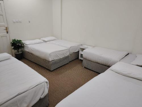 Ένα ή περισσότερα κρεβάτια σε δωμάτιο στο Hotel Dar Al-Ashraf Madina