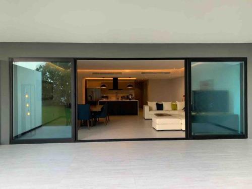 a view of a living room from inside a house at Modern and spacious apartment in Narval, Bucerías in Cedro