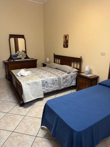 Una cama o camas en una habitación de La casa di Egizia