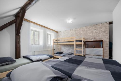 Postel nebo postele na pokoji v ubytování MERTLIN Resort