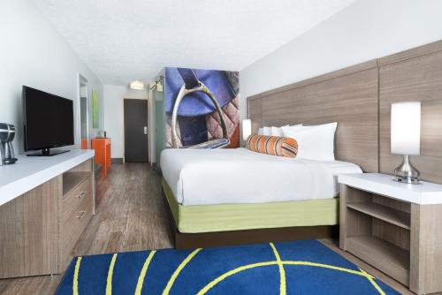 Postel nebo postele na pokoji v ubytování Hotel Indigo Cleveland Beachwood by IHG