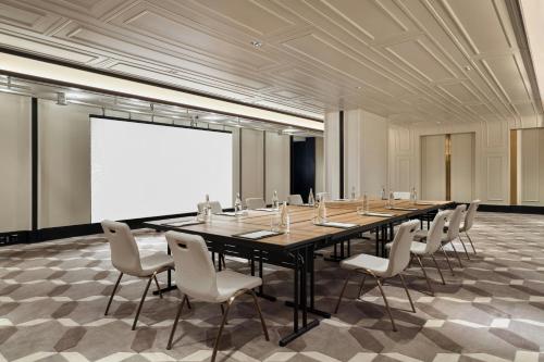 a large conference room with a long table and chairs at The Millen Penang, Autograph Collection in George Town