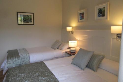 Un ou plusieurs lits dans un hébergement de l'établissement Doonshean View 2 bed self contained apartment