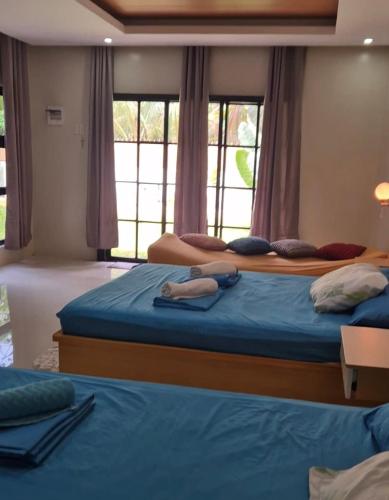 Katil atau katil-katil dalam bilik di Villa de Miguel