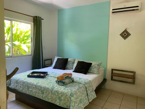 Ένα ή περισσότερα κρεβάτια σε δωμάτιο στο Cote Pacific Casitas