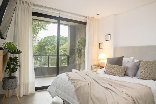 Gulta vai gultas numurā naktsmītnē Beautiful apartment, fully equipped