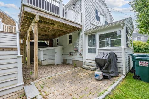 a backyard with a garage and a house at 7 Bodfish Avenue Sandwich - Life's A Beach! in Sandwich