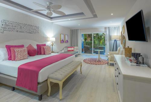 Кровать или кровати в номере Catalonia Playa Maroma - All Inclusive
