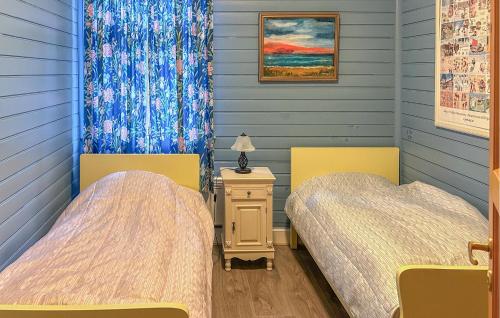Ένα ή περισσότερα κρεβάτια σε δωμάτιο στο Gorgeous Home In Tonstad With Wifi