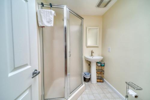 a bathroom with a shower and a sink at 3 Bedroom Cape House by Leavetown Vacations in Sandwich