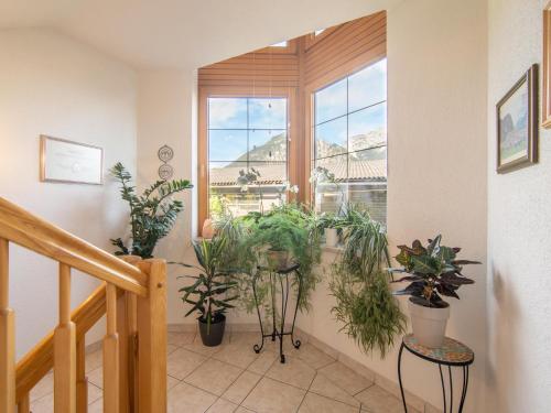 a room with a bunch of plants and a window at Schleicherhof I in Strass im Zillertal