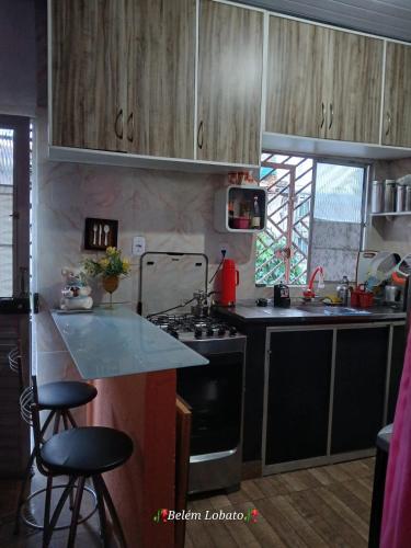 Kuchyň nebo kuchyňský kout v ubytování Belém house