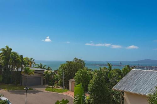 a view of the ocean from a house at The Lookout in Belgian Gardens
