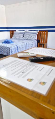 Postel nebo postele na pokoji v ubytování Praieira Pousada&Hostel