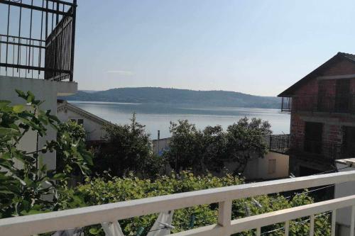 a view of a body of water from a house at Apartments by the sea Bilice, Krka - 23875 in Šibenik