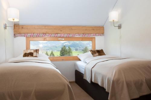 Postel nebo postele na pokoji v ubytování Ferienloft Waldblick