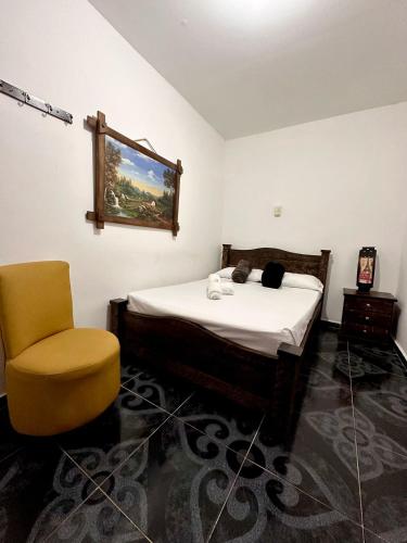 Katil atau katil-katil dalam bilik di Paisaje Cafetero Hotel Con Piscina y desayuno - Filandia