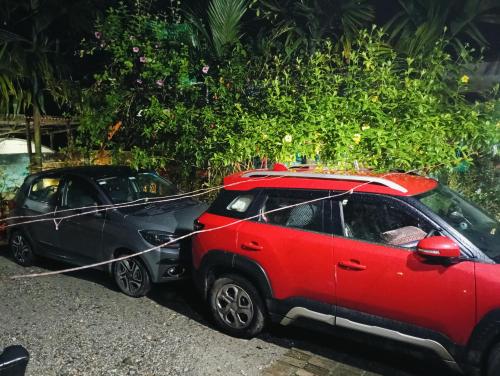 a car is hooked up to a car at Green View Homestay in Siliguri