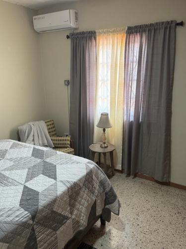 Llit o llits en una habitació de Constant Spring Oasis