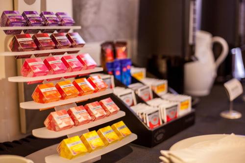 a display of different types of food on shelves at City Lodge Hotel at OR Tambo International Airport in Kempton Park