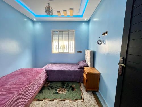 Katil atau katil-katil dalam bilik di Charming apartment