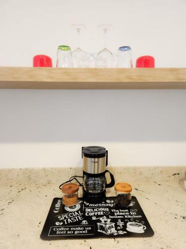 a coffee maker sitting on top of a counter at Habitación tipo Look Off in La Paz