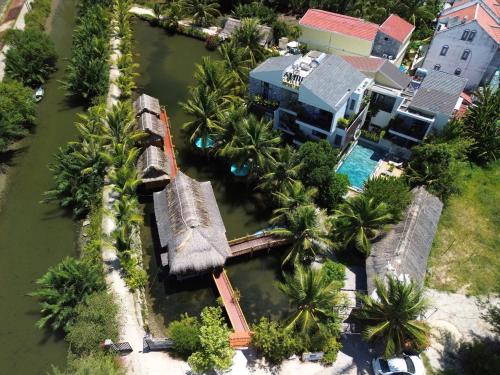 an aerial view of a resort with a pool at Alina Retreat in Hiếu Nhơn