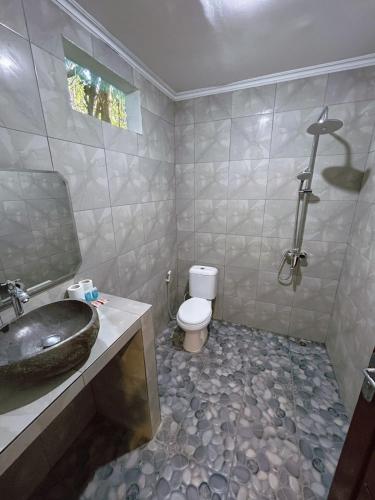 Ένα μπάνιο στο Sayang Bungalows