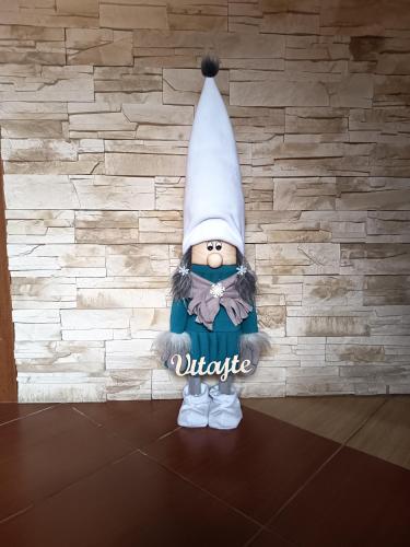 a statue of a person wearing a chef practition at Domček KaMi in Kráľová Lehota