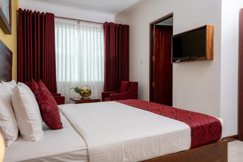 Cama o camas de una habitación en Mirage Colombo