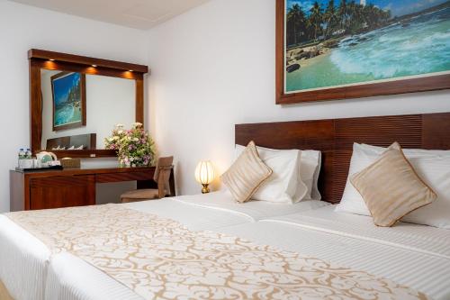Cama o camas de una habitación en Mirage Colombo
