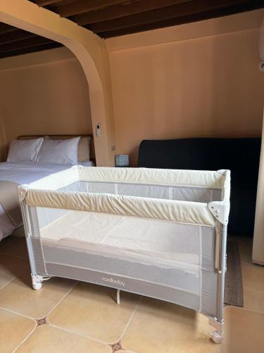 เตียงในห้องที่ YAIMAII HOME-A tranquil stay in the heart of Luang Prabang
