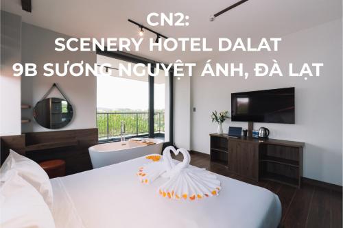 Postel nebo postele na pokoji v ubytování Greenview City Hotel