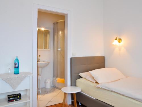 Ένα ή περισσότερα κρεβάτια σε δωμάτιο στο Hotel Gregory Wyk auf Föhr