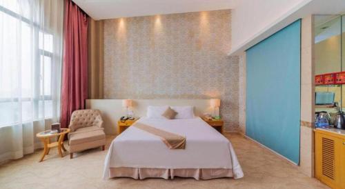 Postel nebo postele na pokoji v ubytování Regency Hotel