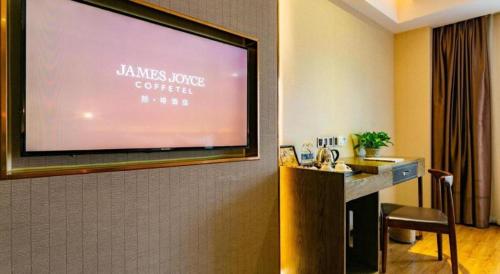James Joyce Coffetel Chengdu Jianshe Road Dongjiao Jiyi Squareにあるテレビまたはエンターテインメントセンター