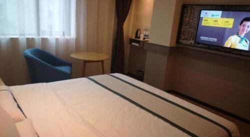 Μια τηλεόραση ή/και κέντρο ψυχαγωγίας στο City Comfort Inn Mianyang Southwest University Of Science And Technology