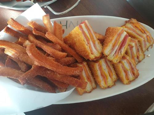 a plate of french fries on a table at Hotel Haus in Gapyeong