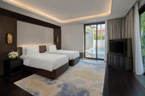 Postel nebo postele na pokoji v ubytování InterContinental Bali Sanur Resort by IHG